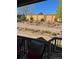 View of backyard from deck showcasing retaining wall with flower beds and privacy fence at 11621 Colony Loop, Parker, CO 80138