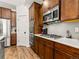 Stylish kitchen with stainless steel appliances, a gas cooktop, and abundant cabinet space at 11621 Colony Loop, Parker, CO 80138
