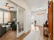 Bright living room with hardwood floors, french doors, and an open layout at 11621 Colony Loop, Parker, CO 80138