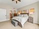 Comfortable main bedroom showcasing a spacious layout, an ensuite bathroom, and elegant decor for a peaceful retreat at 11621 Colony Loop, Parker, CO 80138
