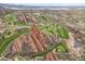 Spectacular view of a golf course with unique rock formations and community at 5688 Red Fern Ct, Littleton, CO 80125