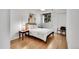 Cozy bedroom with hardwood floors, stylish decor, and natural light at 5688 Red Fern Ct, Littleton, CO 80125