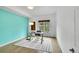 Bright office with hardwood floors, glass desk, and scenic views at 5688 Red Fern Ct, Littleton, CO 80125