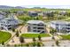 Scenic aerial view highlighting the residential neighborhood, complete with green spaces and community walking paths at 16262 W 95Th Ln, Arvada, CO 80007