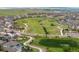 Aerial view of a neighborhood with sidewalks, greenways, and recreation trails at 16262 W 95Th Ln, Arvada, CO 80007