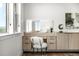 Bright vanity area boasting scenic views and natural light at 16262 W 95Th Ln, Arvada, CO 80007