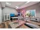 Basement office space with lots of natural light, fish tanks, and space for a desk at 16101 Iola St, Brighton, CO 80602