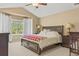 Spacious main bedroom showcasing a large window, vaulted ceiling, and neutral paint at 15021 Josephine St, Thornton, CO 80602