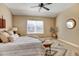 Neutral bedroom featuring a decorative rug and bench at 4742 Raven Run, Broomfield, CO 80023