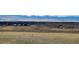 Sweeping landscape view showcases distant mountains and open plains at 4742 Raven Run, Broomfield, CO 80023