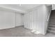 Basement featuring neutral carpet, white walls, and an accessible closet at 11820 Lincoln St, Northglenn, CO 80233