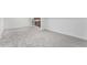 Spacious finished basement with neutral carpet and white walls at 11820 Lincoln St, Northglenn, CO 80233