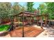 Backyard showcasing a covered gazebo, a patio, and a BBQ grill at 9994 Quintero St, Commerce City, CO 80022