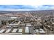 Wide aerial view of a neighborhood, showcasing the property's location and nearby amenities at 11455 W 17Th Pl, Lakewood, CO 80215