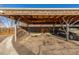 Carport featuring a wooden structure offering protection from the elements and covered parking at 11455 W 17Th Pl, Lakewood, CO 80215