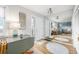 Welcoming entryway featuring hardwood floors and ample lighting and large mirrors at 11455 W 17Th Pl, Lakewood, CO 80215