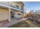 Charming condo facade with a brick exterior, balcony, and lovely curb appeal at 11455 W 17Th Pl, Lakewood, CO 80215