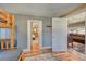 Bedroom with connecting doors to other rooms and a bunk bed on the left at 4642 Plettner Ln, Evergreen, CO 80439