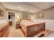 Comfortable bedroom with wooden furniture and a peaceful ambiance at 4642 Plettner Ln, Evergreen, CO 80439