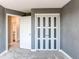 Bedroom featuring neutral colors and a closet with sliding glass doors at 4392 E 126Th Pl, Thornton, CO 80241