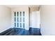 This bedroom has a closet with sliding doors, and another door leading to additional rooms at 4392 E 126Th Pl, Thornton, CO 80241