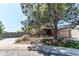 Charming home exterior with a paved driveway and stone landscaping, perfect for suburban living at 4392 E 126Th Pl, Thornton, CO 80241