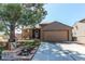 Charming single-Gathering home with a well-manicured lawn, mature tree, and an inviting front porch at 4392 E 126Th Pl, Thornton, CO 80241