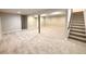 Spacious finished basement with carpeting, neutral colors, and ample room for recreation or storage at 10253 W 68Th Way, Arvada, CO 80004