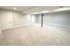 Large finished basement with neutral carpet and paint, offering versatile space for various uses at 10253 W 68Th Way, Arvada, CO 80004