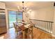 Bright dining area with sliding door to the backyard and hardwood floors at 10253 W 68Th Way, Arvada, CO 80004