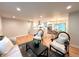 Open concept living space with updated kitchen, dining area, and living room at 10253 W 68Th Way, Arvada, CO 80004