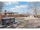 Large backyard featuring a hot tub, gazebo, and small playhouse for enjoying outdoor living at 767 Ellis St, Golden, CO 80401