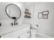 Modern bathroom with a stylish vanity, mirror, and sleek fixtures at 767 Ellis St, Golden, CO 80401