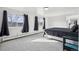 Spacious bedroom with carpet, natural light from many windows, and neutral walls at 767 Ellis St, Golden, CO 80401