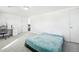 Bright bedroom featuring carpet, bed, and white walls at 767 Ellis St, Golden, CO 80401
