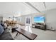 Bright living room with a sliding glass door leading to the backyard and an open concept layout at 767 Ellis St, Golden, CO 80401