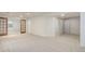 Spacious finished basement is complete with plush carpeting and multiple egress windows at 16159 W 70Th Pl, Arvada, CO 80007