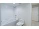 Bathroom features white tile and shower head at 16159 W 70Th Pl, Arvada, CO 80007