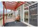 Covered outdoor deck features a pergola and views of community at 16159 W 70Th Pl, Arvada, CO 80007