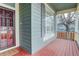 The house features a welcoming front porch, perfect for relaxing and enjoying the neighborhood at 16159 W 70Th Pl, Arvada, CO 80007