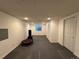 Finished basement with gym equipment and black padded floors at 9806 Hooker Ct, Westminster, CO 80031