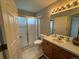 Bathroom with shower-tub combination and single sink vanity at 9806 Hooker Ct, Westminster, CO 80031