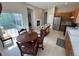 Eat-in kitchen with table, chairs, and stainless steel appliances at 9806 Hooker Ct, Westminster, CO 80031