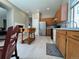 Spacious kitchen with wooden cabinets and eat-in table at 9806 Hooker Ct, Westminster, CO 80031