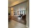 Bright living room features a fireplace, wood floors, and large windows at 9806 Hooker Ct, Westminster, CO 80031