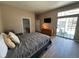 Bright main bedroom with ensuite bathroom and hardwood floors at 9806 Hooker Ct, Westminster, CO 80031