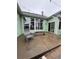 Covered patio area with outdoor seating and large windows for natural light at 9806 Hooker Ct, Westminster, CO 80031