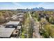 Enjoy a spectacular city skyline view from this charming neighborhood, captured in this aerial view at 3201 W 25Th Ave, Denver, CO 80211