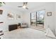 Inviting bonus room with outside views, neutral walls, light carpet and a modern ceiling fan at 3201 W 25Th Ave, Denver, CO 80211