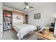 Bedroom featuring a built-in murphy bed and a home office area at 3201 W 25Th Ave, Denver, CO 80211